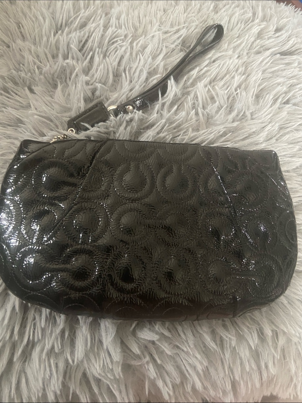 The Coach Signature Debossed Patent Leather black Wristlet H0993 - 43229